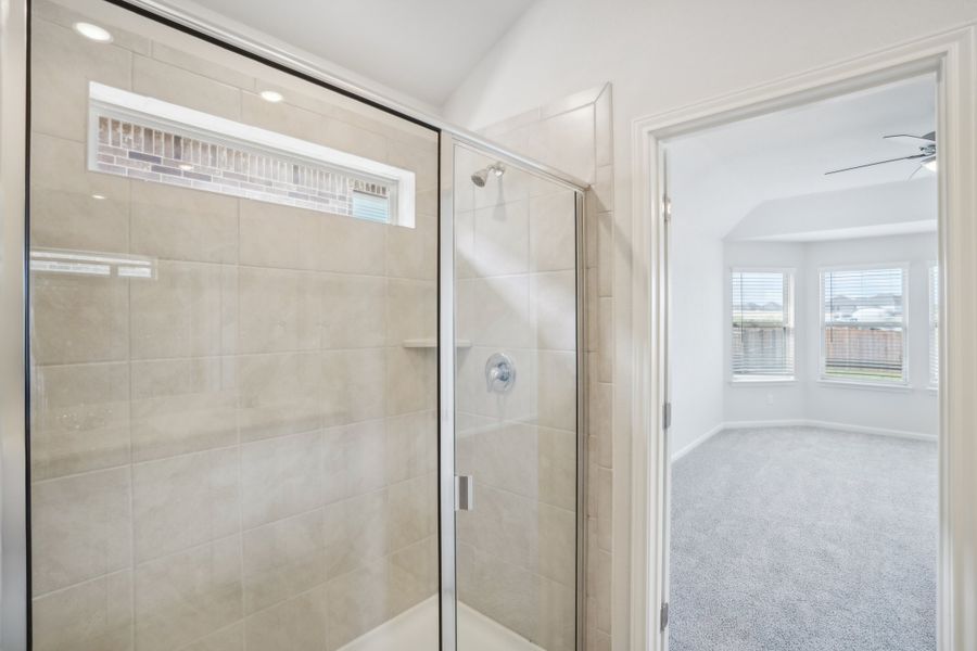 Primary suite bathroom in the Callaghan floorplan at a Meritage Homes community.