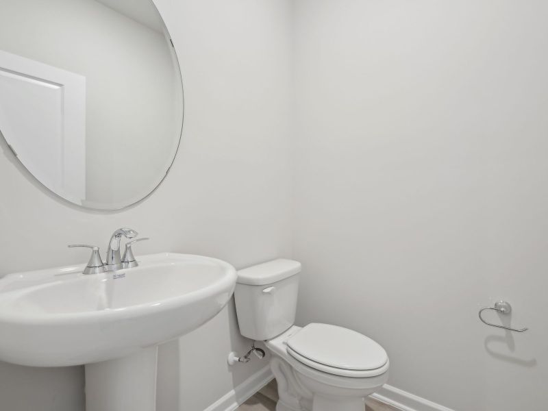 A half-bath is conveniently located on the first floor.