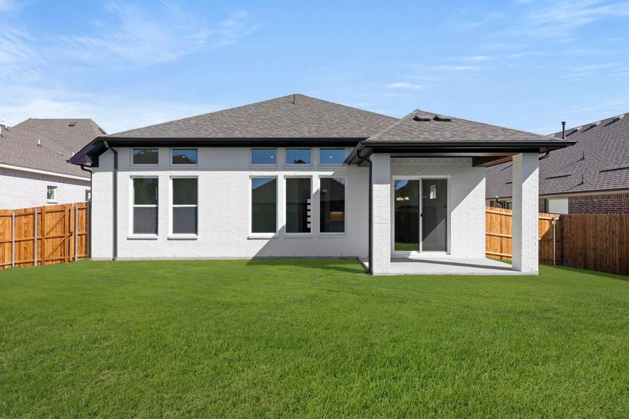 Exterior details and patio area of a home in West Crossing, Anna (Image 4).