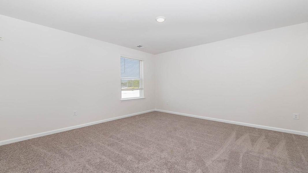 Spacious, unfurnished interior of a new home in The Ranch, Holly Hill (Image 27).