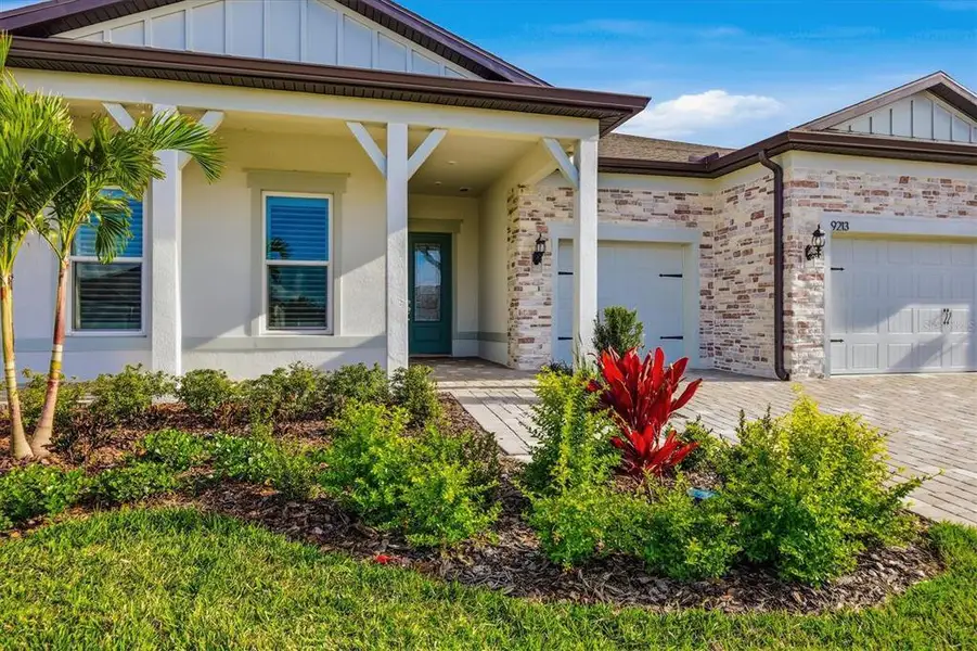 Exterior details and patio area of a home in , Parrish (Image 3).