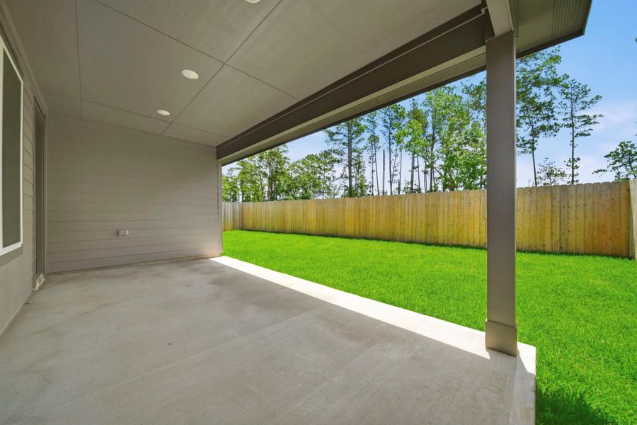 Exterior details and patio area of a home in Mill Creek Estates, Magnolia (Image 17).