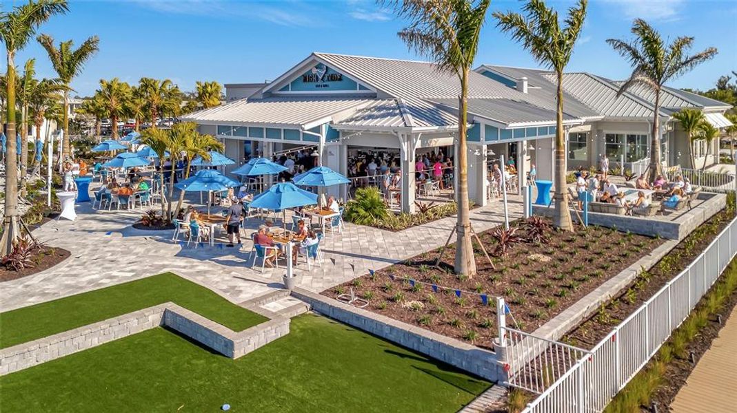 Front exterior of a new home in , Englewood, FL, highlighting curb appeal (Image 29). Front exterior of a new home in , Englewood, FL, highlighting curb appeal (Image 29).