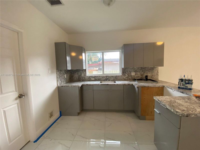 Furnished interior view inside a new home in , Miami (Image 5). Furnished interior view inside a new home in , Miami (Image 5).