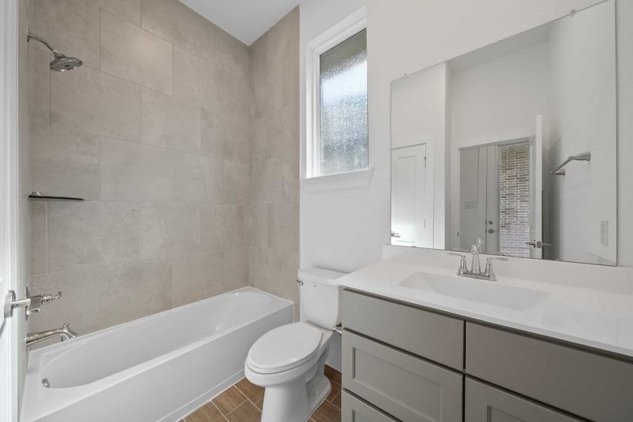 Furnished interior view inside a new home in Meridiana, Manvel (Image 11).