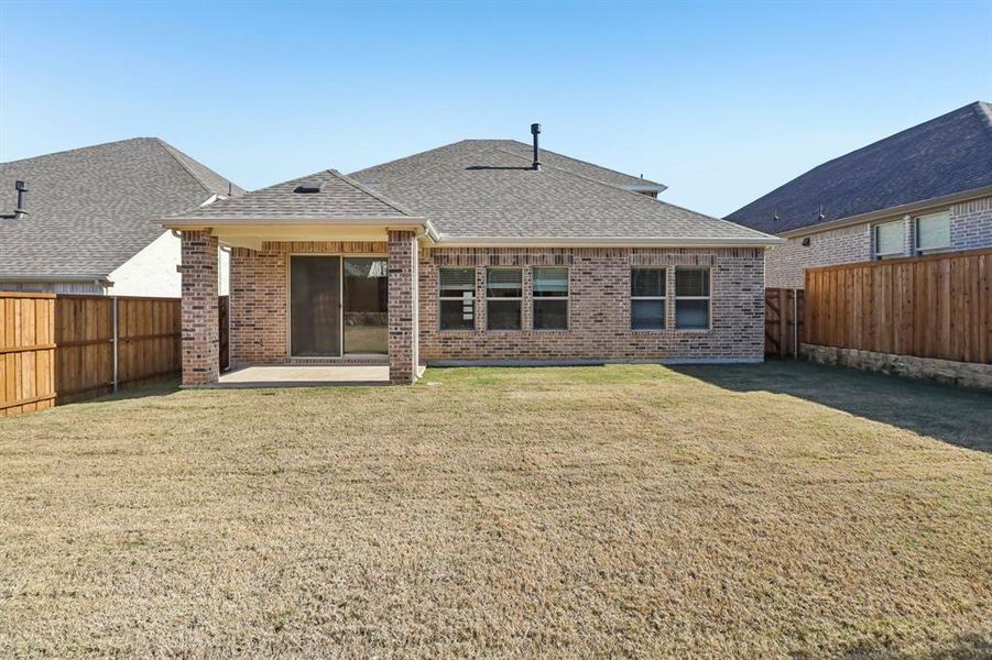 Exterior details and patio area of a home in Ashford Park - Texana Series, Corinth (Image 4).