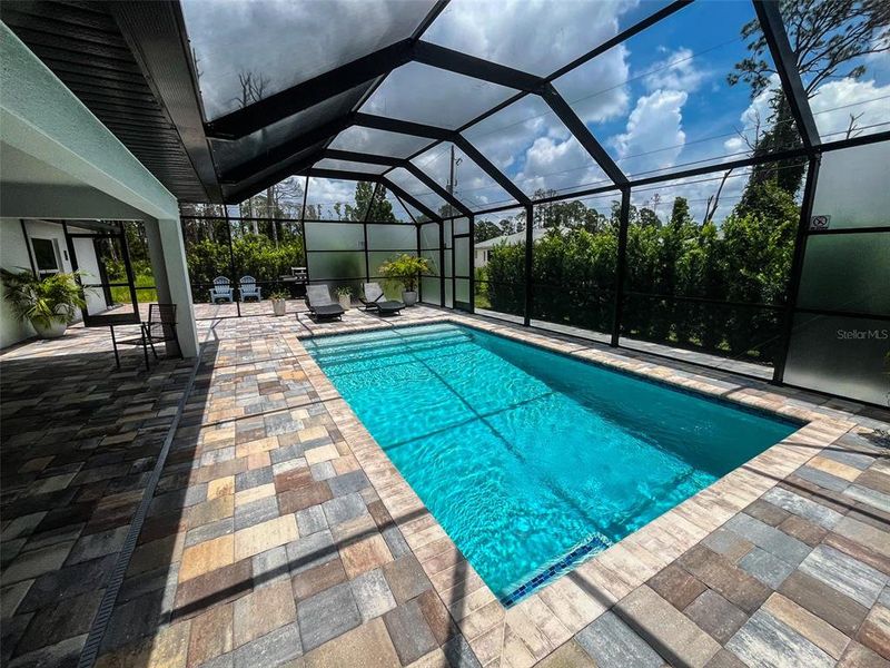 Exterior details and patio area of a home in , North Port (Image 23).