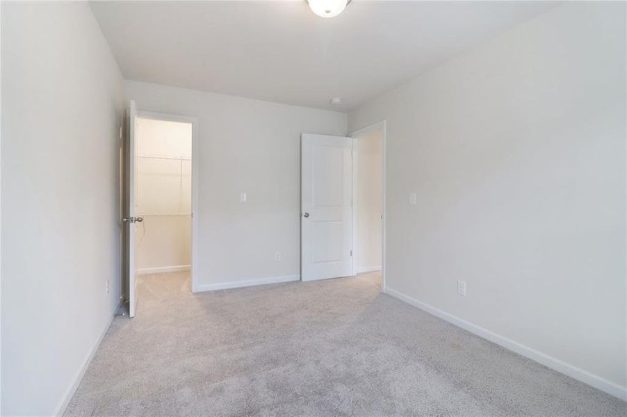 Spacious, unfurnished interior of a new home in Cambridge at Towne Center, Hoschton (Image 21).