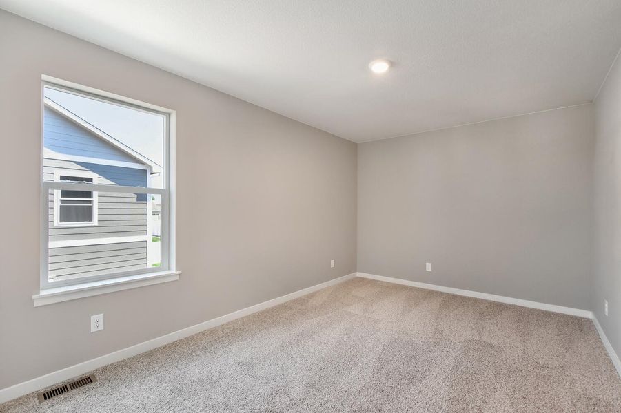 Representative unfurnished interior of a home built from the Holcombe by D.R. Horton in Brighton Crossing, Brighton (Image 24).