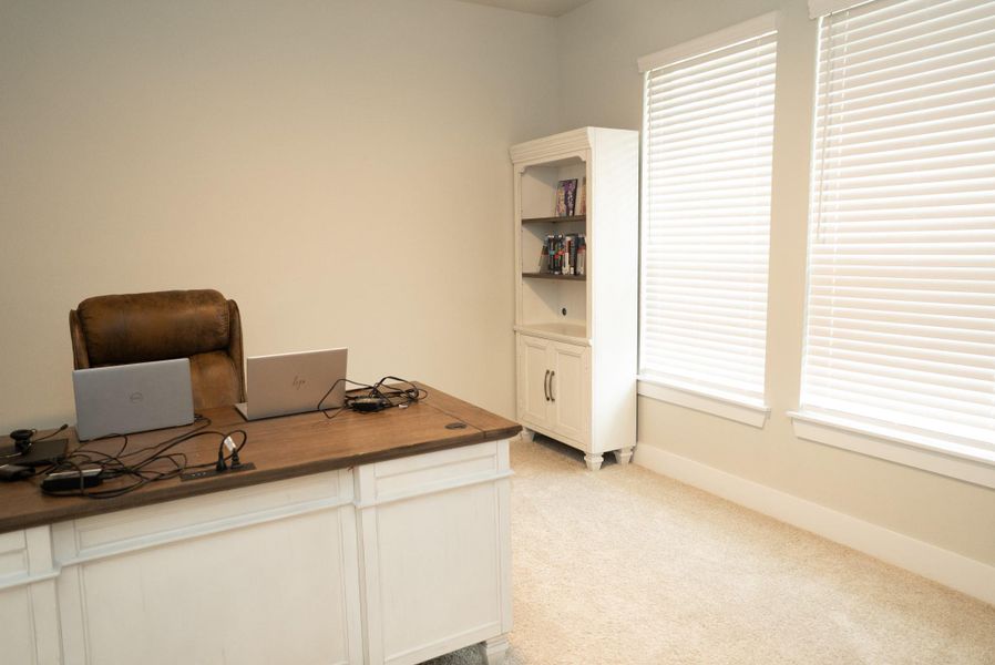 Furnished interior view inside a new home in Sunterra, Katy (Image 12).