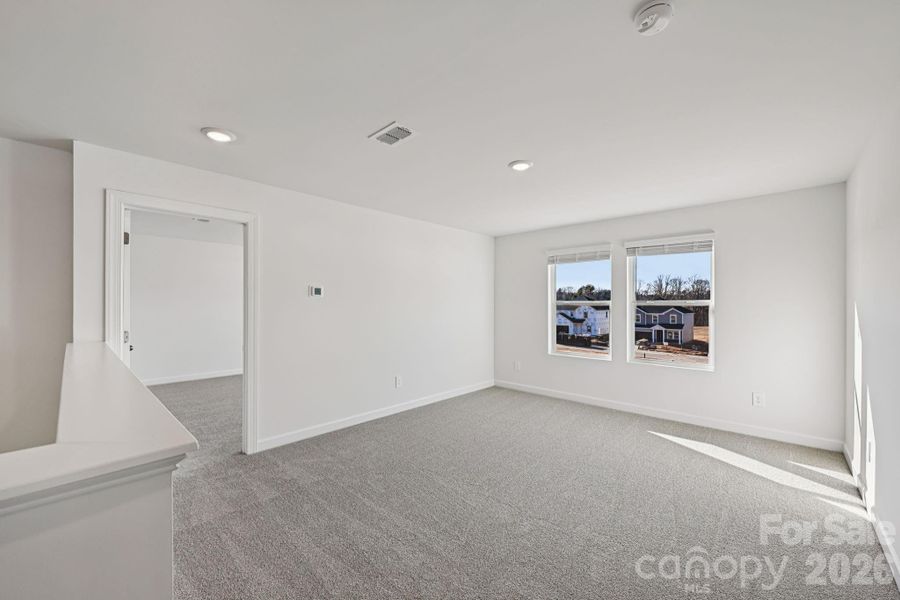 Photo is not of the actual home, but is an inspirational photo of builder’s model home and may depict options, furnishings, and/or decorator features that are not included