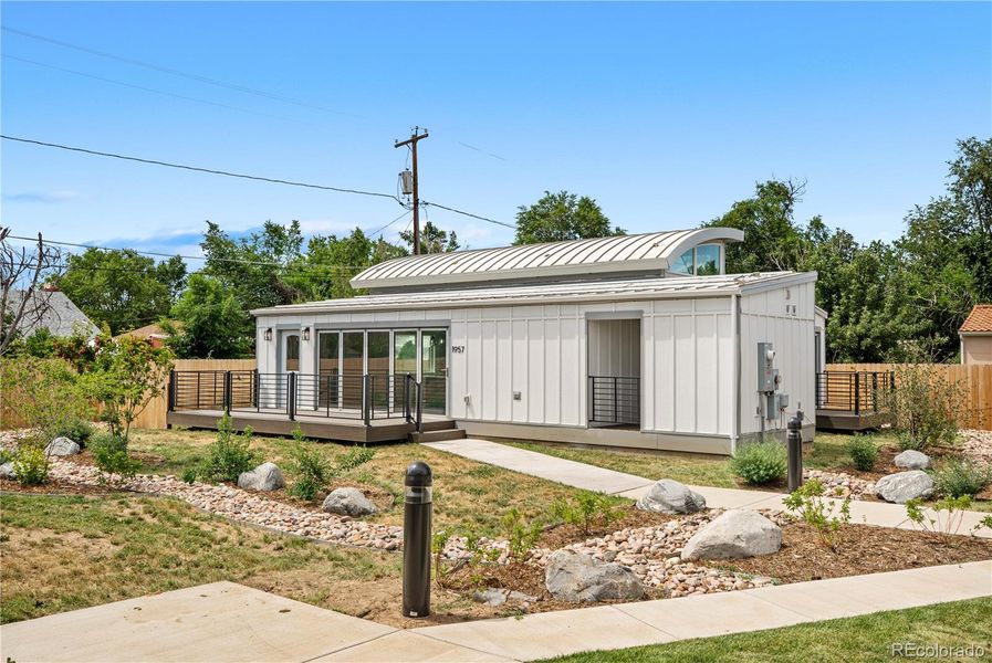 Front exterior of a new home in , Aurora, CO, highlighting curb appeal (Image 2).