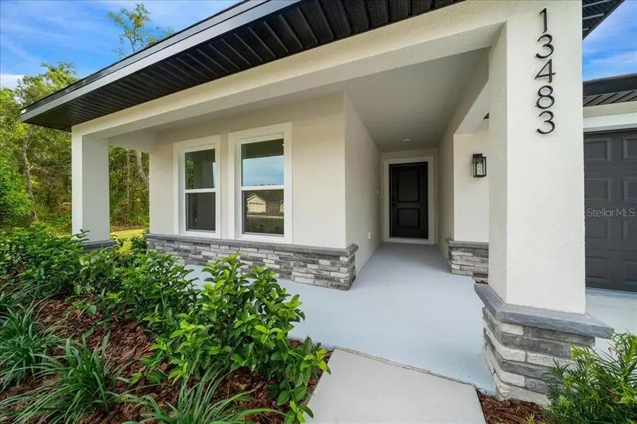 Exterior details and patio area of a home in , Brooksville (Image 34). Exterior details and patio area of a home in , Brooksville (Image 34).