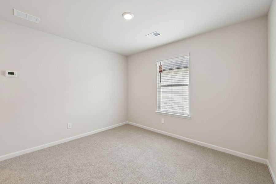 Spacious, unfurnished interior of a new home in Hawthorne Station, College Park (Image 13).