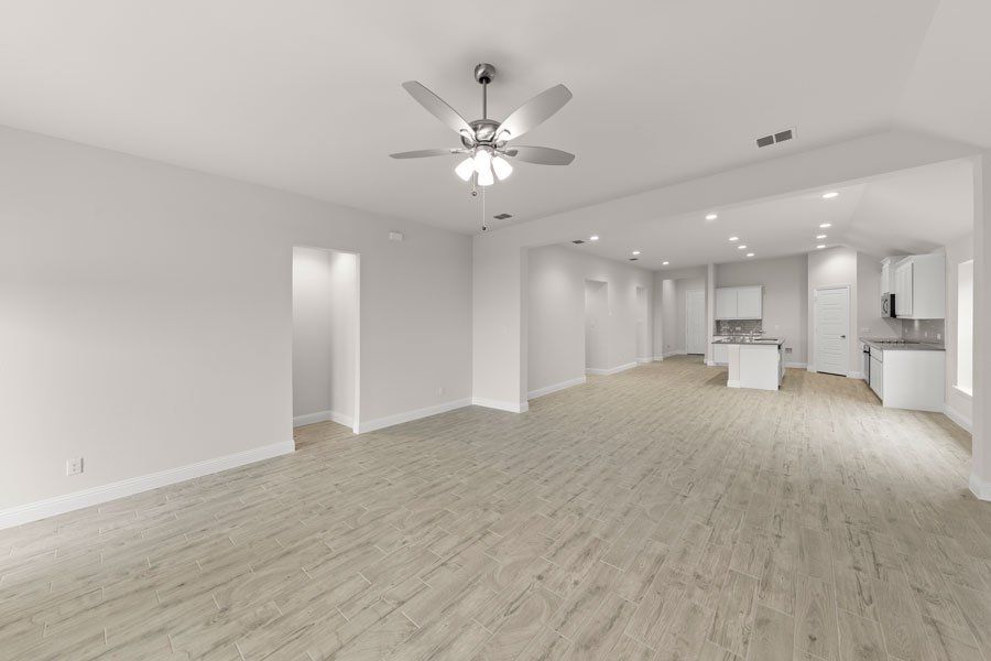 Representative exterior photo of a completed home built from the Kingston by Impression Homes in Timberbrook, Justin, TX (Image 13).