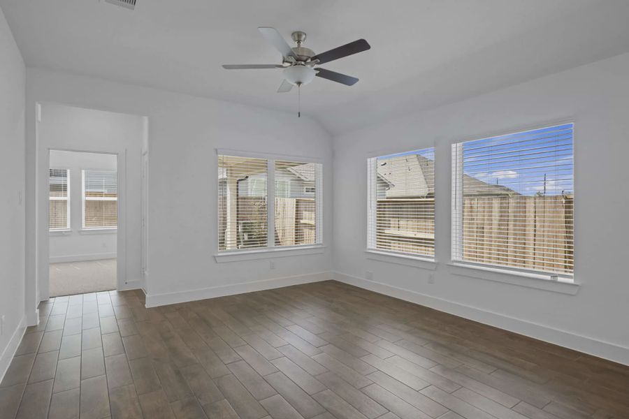 Representative unfurnished interior of a home built from the Carriagehouse by Chesmar Homes in Meridiana Townhomes, Iowa Colony (Image 82).