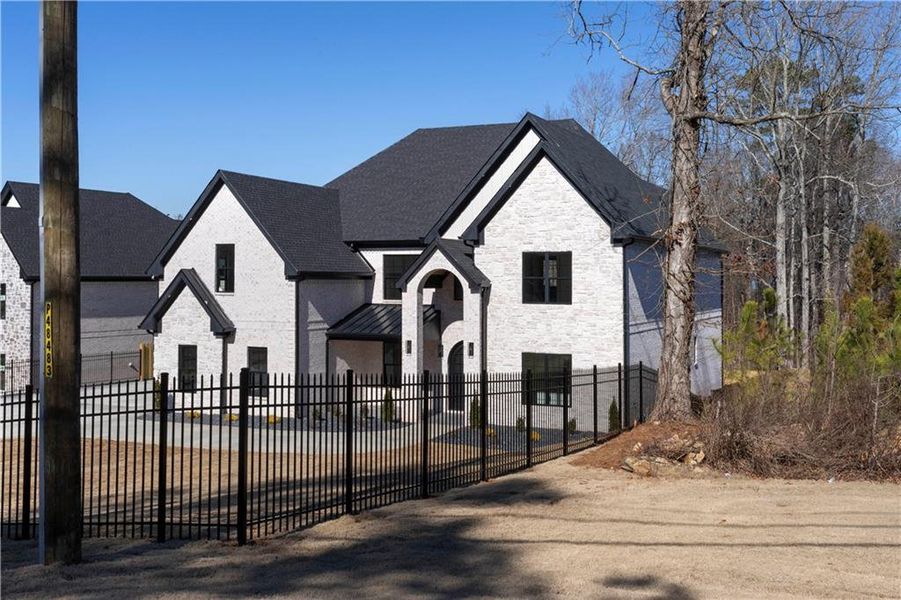 Front exterior of a new home in , Suwanee, GA, highlighting curb appeal (Image 31).