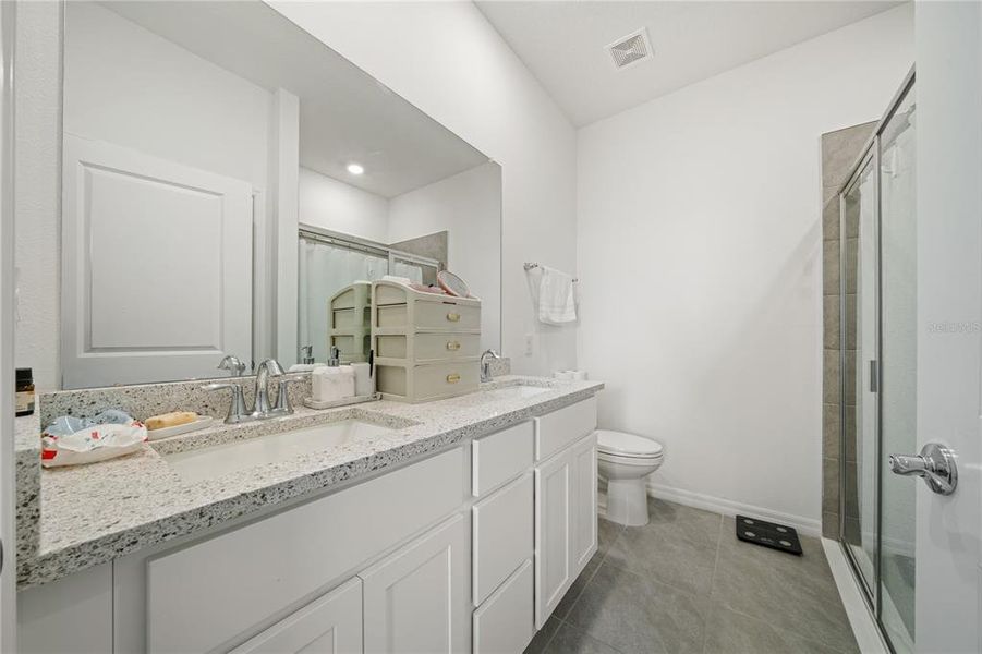 Furnished interior view inside a new home in Towns at Woodsdale Villas, Wesley Chapel (Image 11).