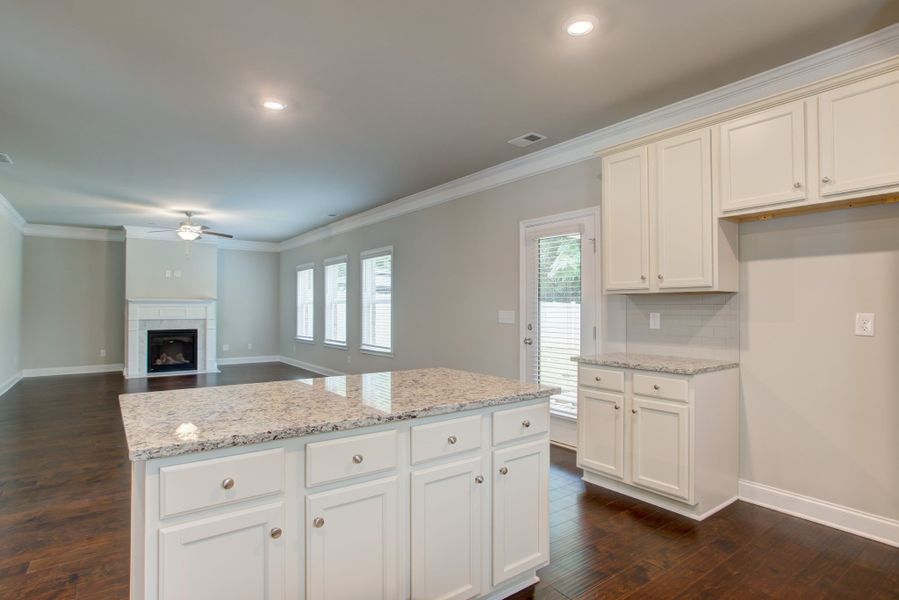 Open kitchen and dining areas are perfect for entertaining friends and family