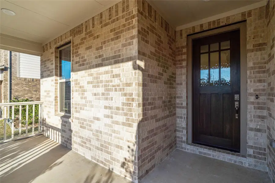 A truly inviting and functional outdoor space, this porch is designed for greeting neighbors or enjoying al-fresco moments with friends. A truly inviting and functional outdoor space, this porch is designed for greeting neighbors or enjoying al-fresco moments with friends.