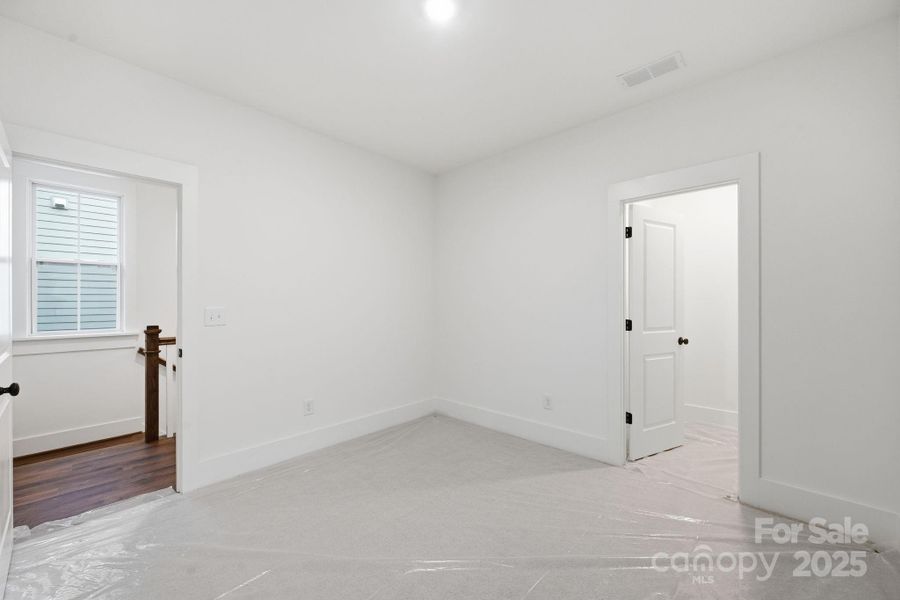 Bedroom #2 features a walk-in closet Bedroom #2 features a walk-in closet