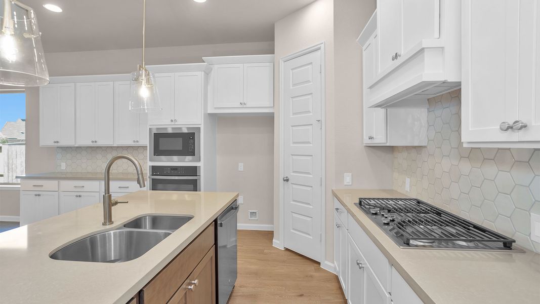 Furnished interior view inside a new home in Meridiana, Manvel (Image 6).