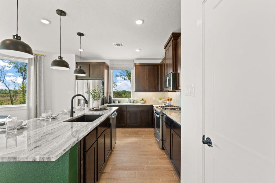 Furnished interior view inside a new home in Meridiana, Manvel (Image 14).