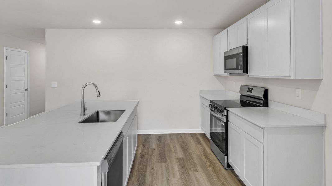 Furnished interior view inside a new home in Bailey Park, Fayetteville (Image 7). Furnished interior view inside a new home in Bailey Park, Fayetteville (Image 7).