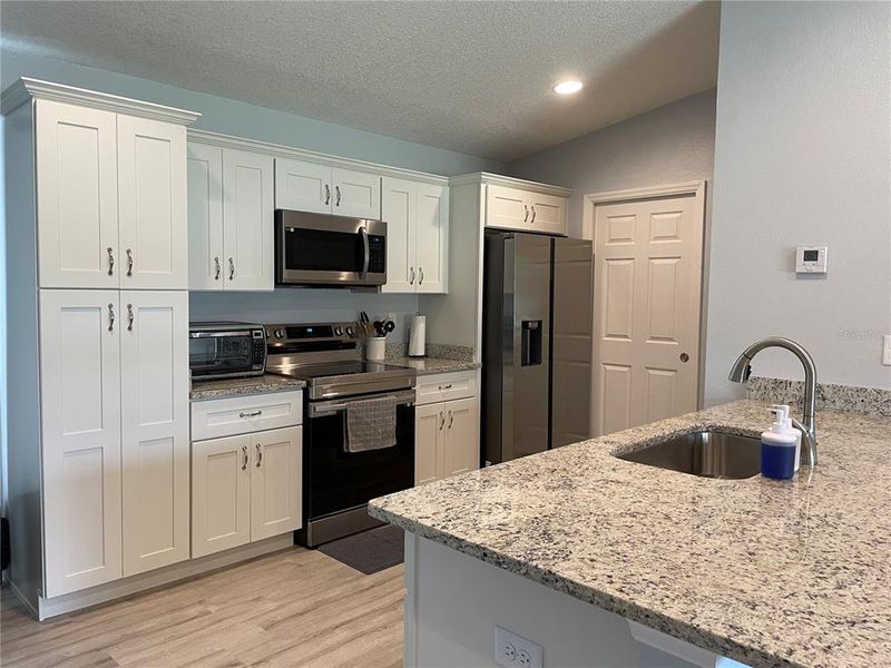 Furnished interior view inside a new home in , Ocala (Image 8).