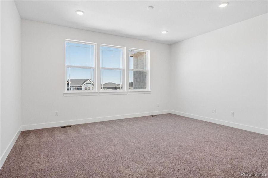 Spacious, unfurnished interior of a new home in Peakview at Ascent Village, Littleton (Image 33).