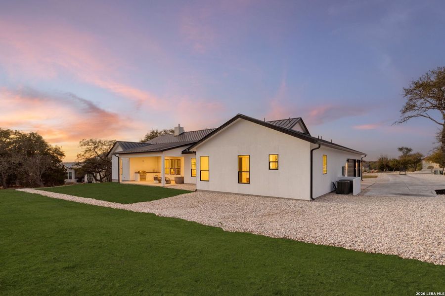 Exterior details and patio area of a home in , Bulverde (Image 26).