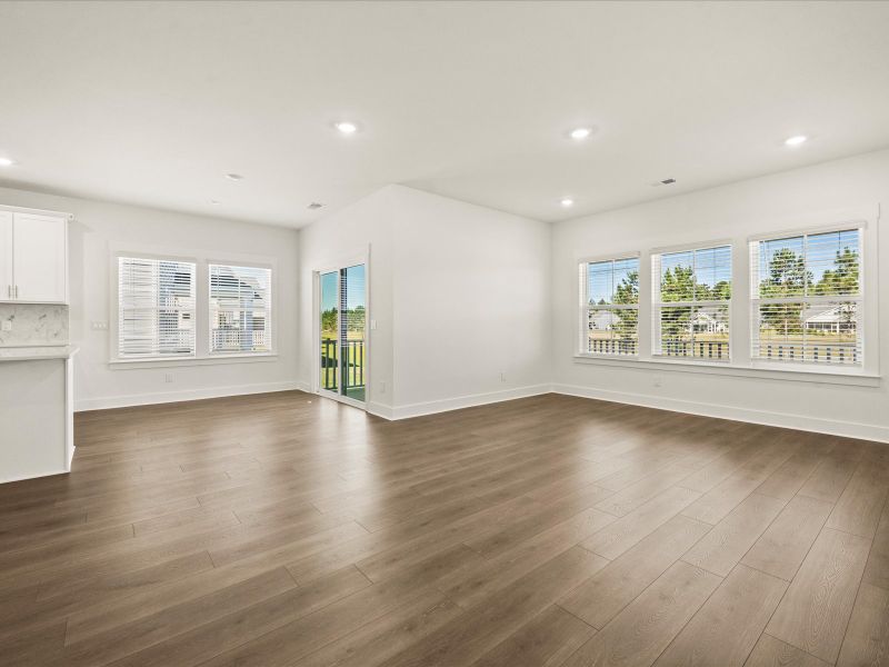 Spacious, unfurnished interior of a new home in The Coves at Lakes of Cane Bay, Summerville (Image 19).