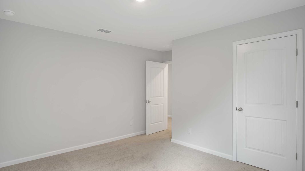 Spacious, unfurnished interior of a new home in The Parks, White House (Image 22). Spacious, unfurnished interior of a new home in The Parks, White House (Image 22).