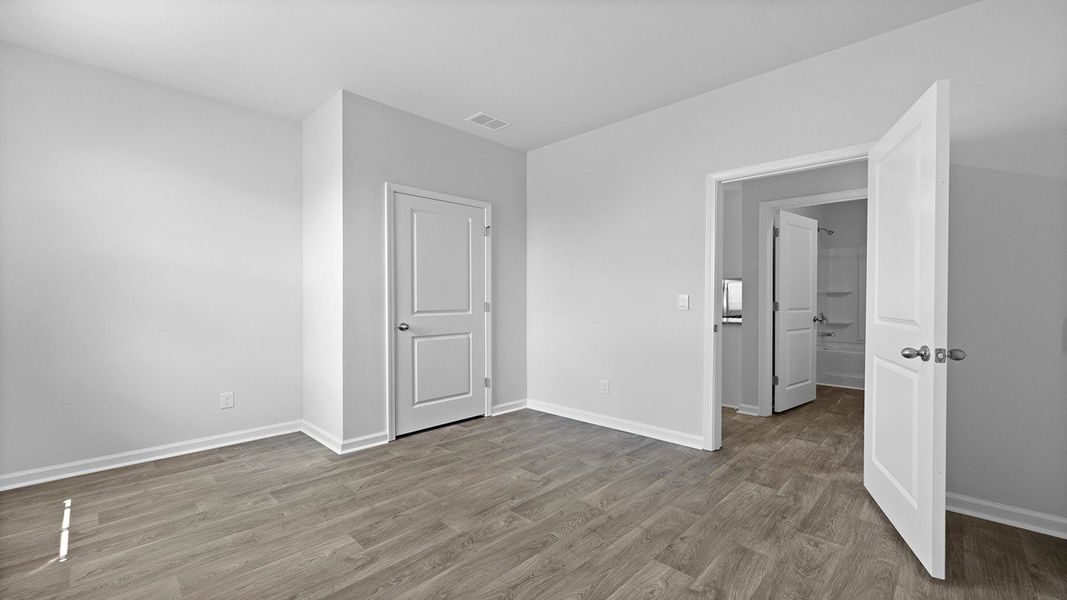 Spacious, unfurnished interior of a new home in Pine Hills at Cane Bay, Summerville (Image 14). Spacious, unfurnished interior of a new home in Pine Hills at Cane Bay, Summerville (Image 14).