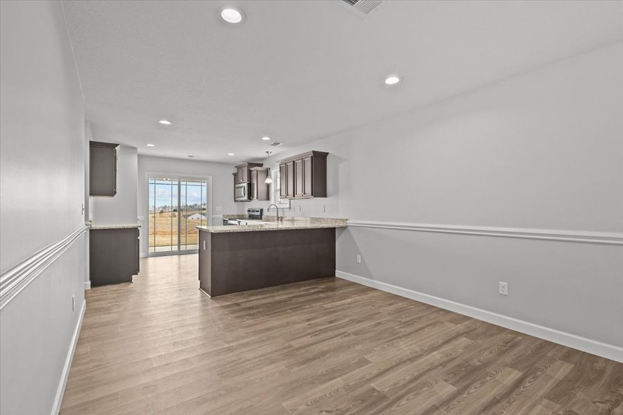Representative furnished interior of a home built from the Ellison by Enchanted Homes in Hampshire Heights, Moore (Image 11).