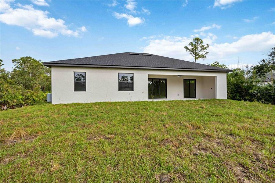 Front exterior of a new home in , Port Charlotte, FL, highlighting curb appeal (Image 21).