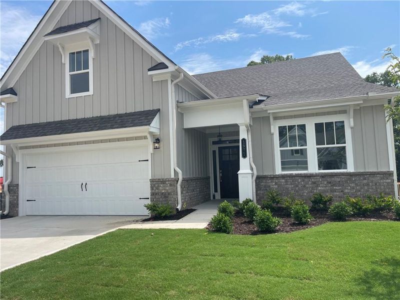 Front exterior of a new home in , Gainesville, GA, highlighting curb appeal (Image 1). Front exterior of a new home in , Gainesville, GA, highlighting curb appeal (Image 1).