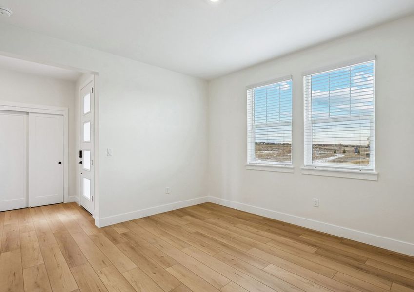 The foyer and family room have large windows that let in great, natural light.