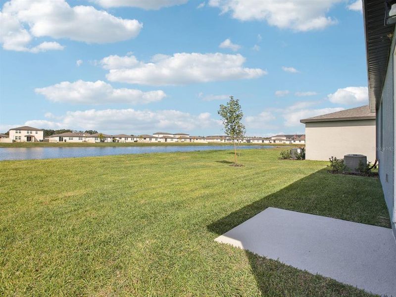 Exterior details and patio area of a home in The Grove at Stuart Crossing - Classic Series, Bartow (Image 2).