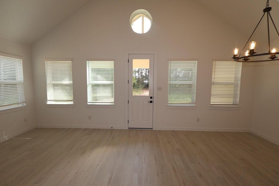Spacious, unfurnished interior of a new home in Tarkington Timbers, Cleveland (Image 19).
