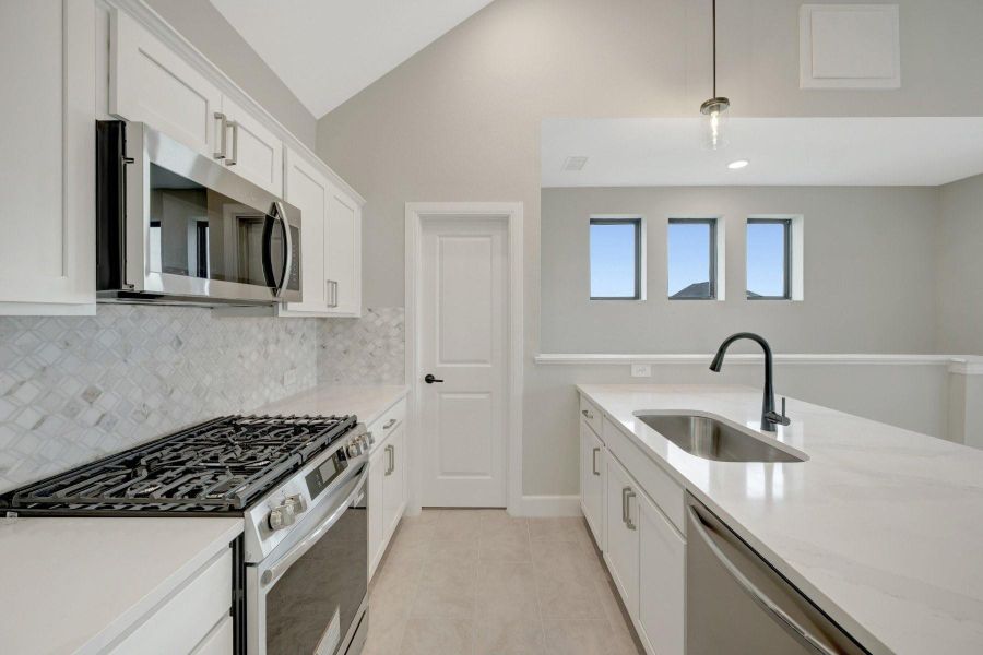 Furnished interior view inside a new home in Riceland - Enclave Row Collection, Mont Belvieu (Image 3).