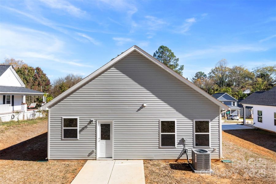 Front exterior of a new home in , Spencer, NC, highlighting curb appeal (Image 19).
