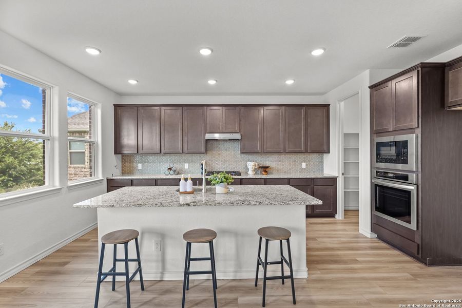 Furnished interior view inside a new home in Ladera, San Antonio (Image 18).