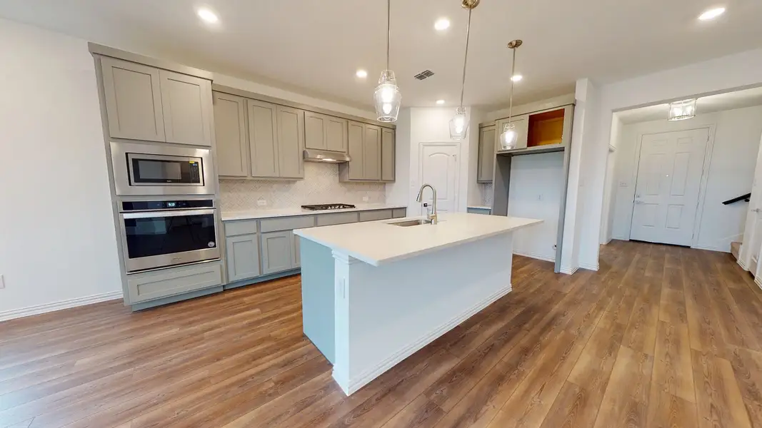 Representative furnished interior of a home built from the Sterling by Ashton Woods in Gateway Parks, Forney (Image 7).