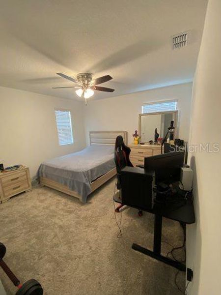 Furnished interior view inside a new home in Storey Creek, Kissimmee (Image 6).
