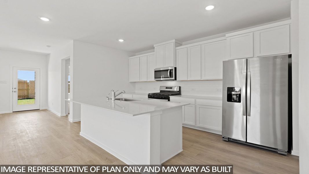 Representative furnished interior of a home built from the Camden by D.R. Horton in Sunterra Lakes, Brookshire (Image 5).
