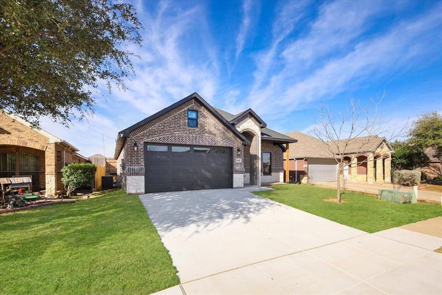 Front exterior of a new home in , Fort Worth, TX, highlighting curb appeal (Image 21). Front exterior of a new home in , Fort Worth, TX, highlighting curb appeal (Image 21).