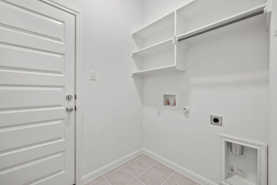 Utility Room in the Birch home plan by Trophy Signature Homes – REPRESENTATIVE PHOTO