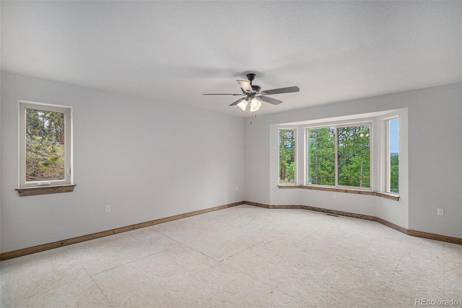 Primary suite with bay windows