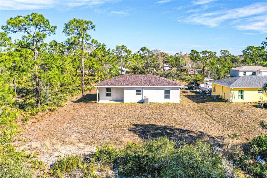 Exterior details and patio area of a home in , Lake Placid (Image 13).